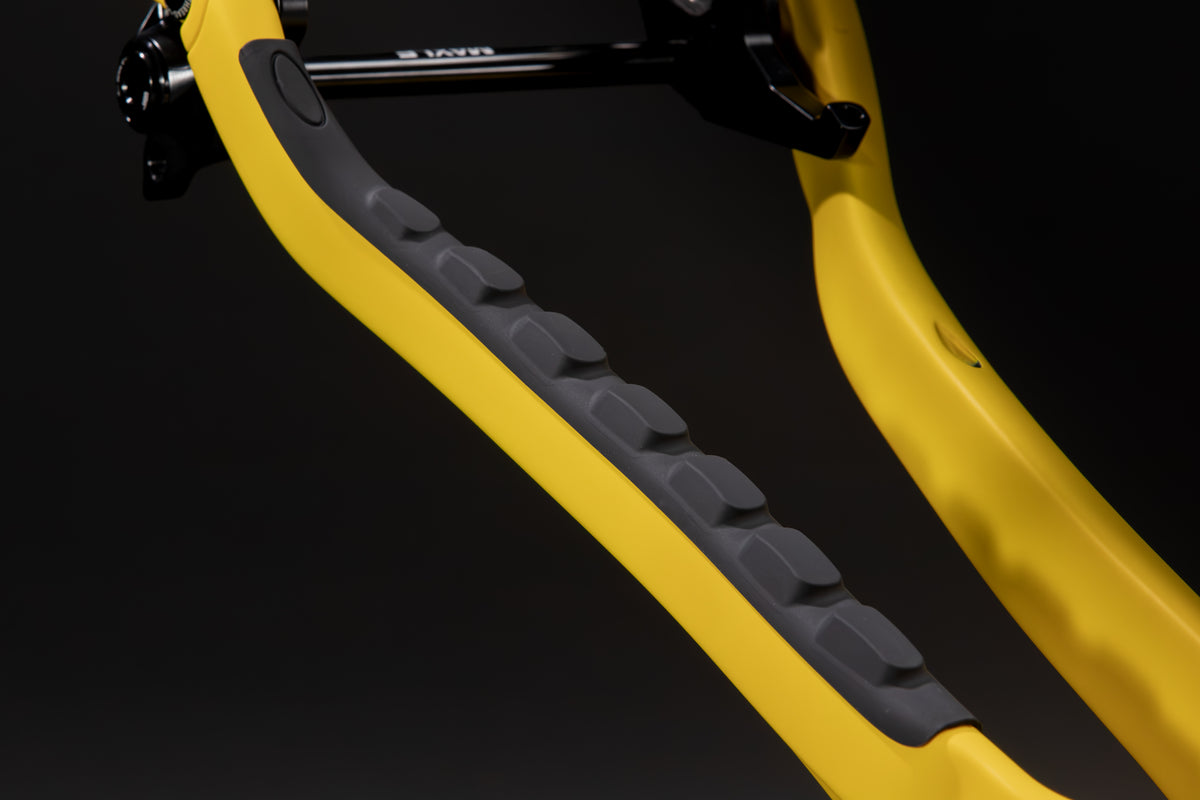 Rocker Carbon Gen 3 in Aspen Glow — Drive-side chainstay with its moulded rubber protector